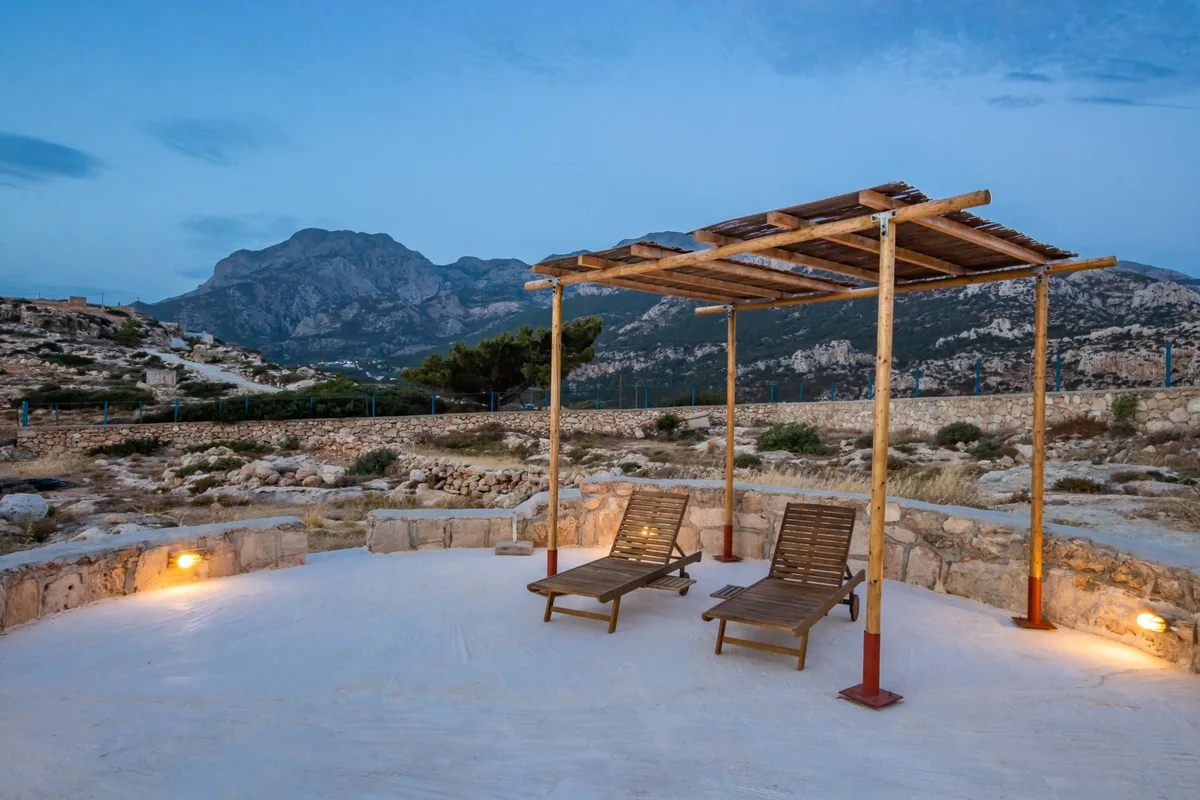 Sea La Vue patio in Lefkos, Karpathos with mountain view